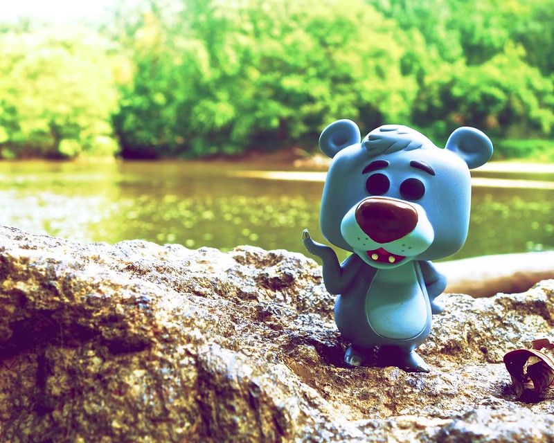 Funko Pop! Disney #55 Baloo Vinyl Figure sitting by a river